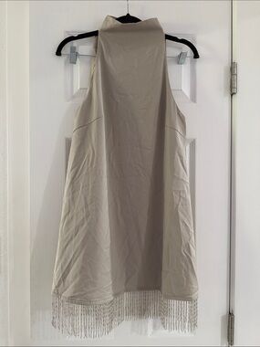 Sleeveless Beige Mini Dress with Fringe Hem